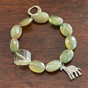 Faceted molded green cellulose acetate bead silver tone zebra stretchy bracelet